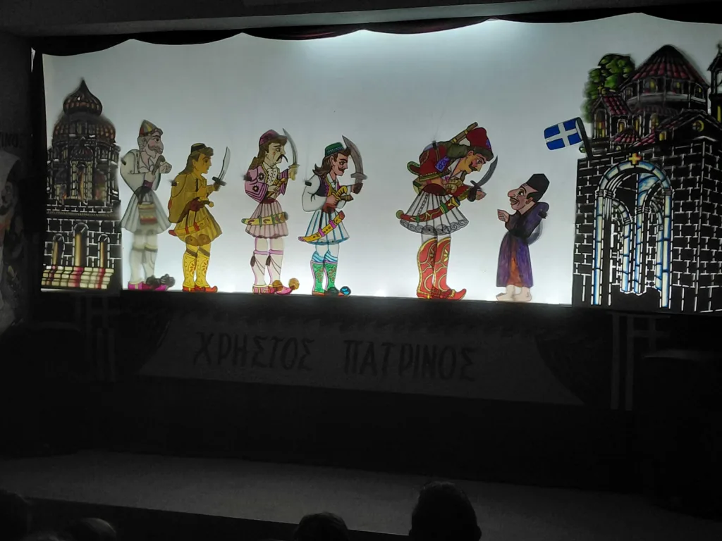 Επετειακή παράσταση από τον Χρήστο Πατρινό «Ο Καραγκιόζης στην επανάσταση και οι ήρωες του 1821» 32 Επετειακή παράσταση από τον Χρήστο Πατρινό «Ο Καραγκιόζης στην επανάσταση και οι ήρωες του 1821»