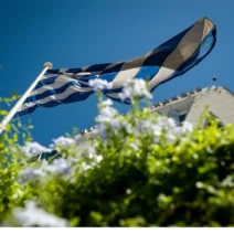 Λογότυπα των εταιρειών αξιολόγησης Scope Ratings και Moody’s