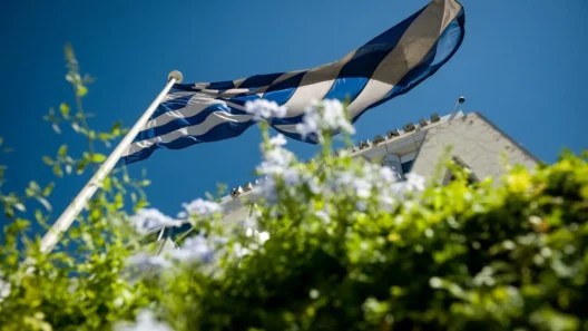 Λογότυπα των εταιρειών αξιολόγησης Scope Ratings και Moody’s